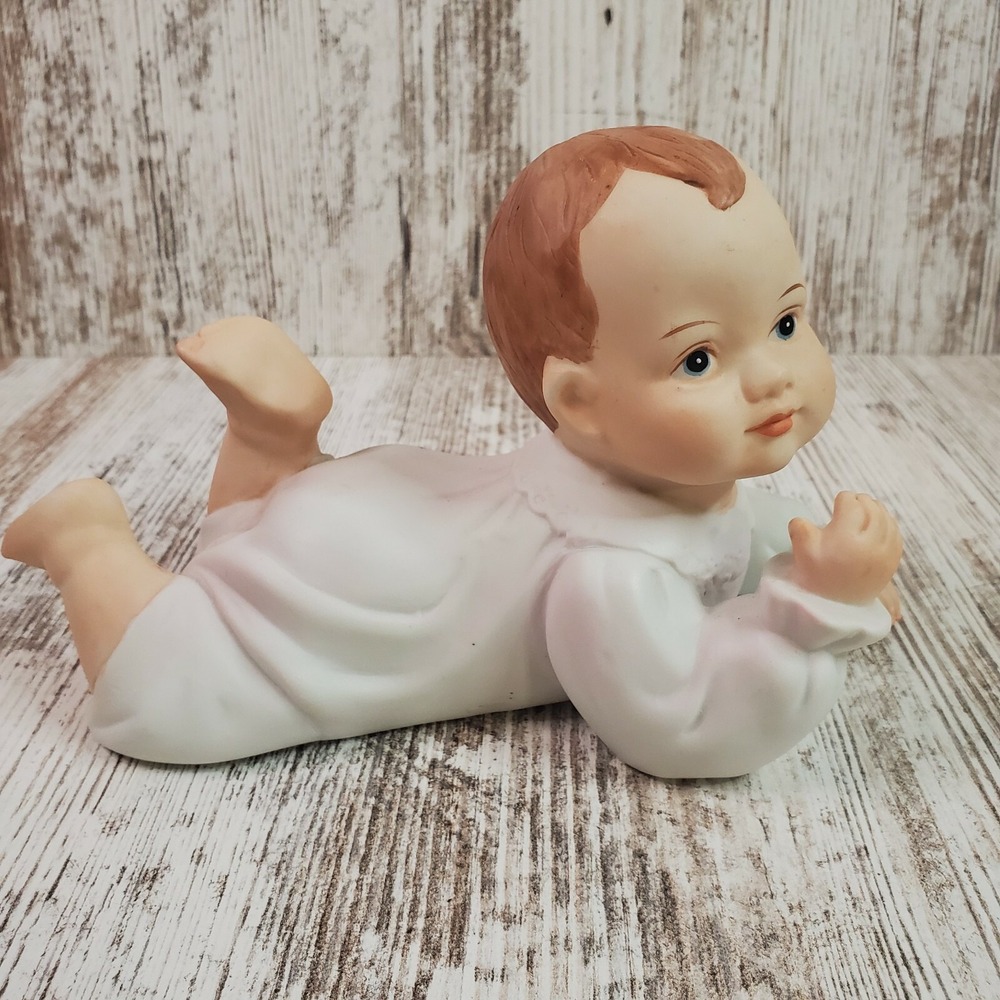 Piano Baby Laying Kicking Feet wearing Nightgown Bisque Porcelain Figurine 7.5"